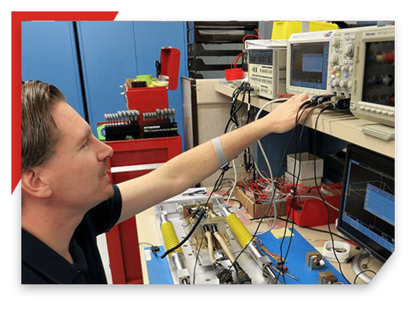 Engineer with testing equipment